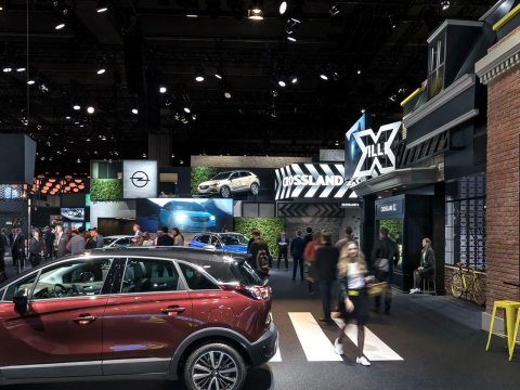 Picture: Opel is presenting its first hybrid vehicle in a natural setting with a green double-deck exhibition stand on a