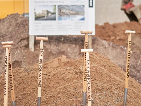 Many project participants turned the first sod for the new eight-sport hall.
